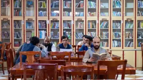 The governing authority outlaw textbooks produced by women from Afghanistan's colleges